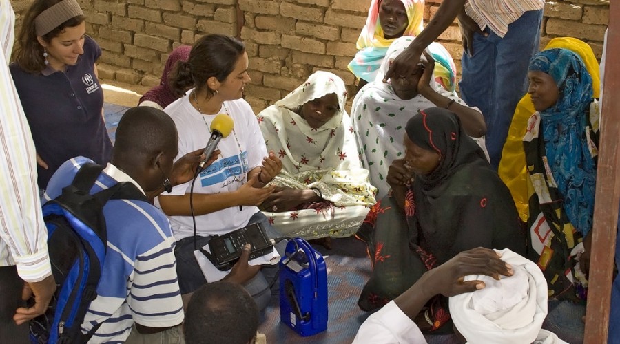 MINURCAT Civil Officer Distributes Radio Transmitters to Refugee Women