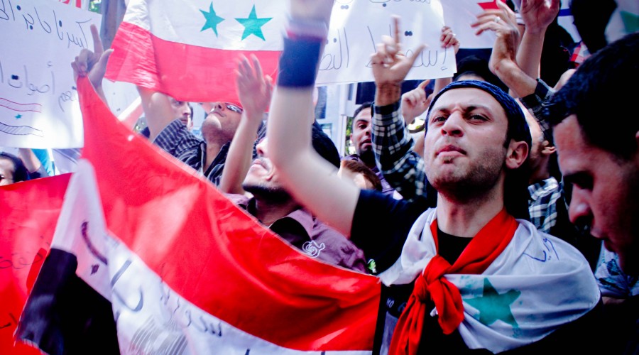 Syrian protesters in front of the Syrian embassy in Cairo