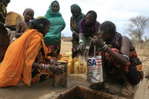 Women at a water hole in Borena, Ethiopia