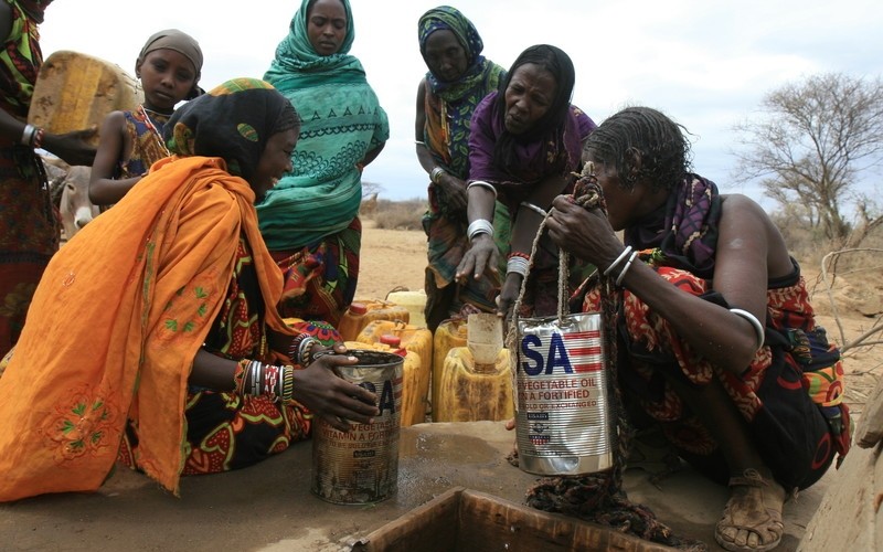 Women at a water hole in Borena, Ethiopia