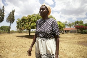 Mama Teresa, 68, with her grandson, Cornel. She cares for four of her grandchildren.