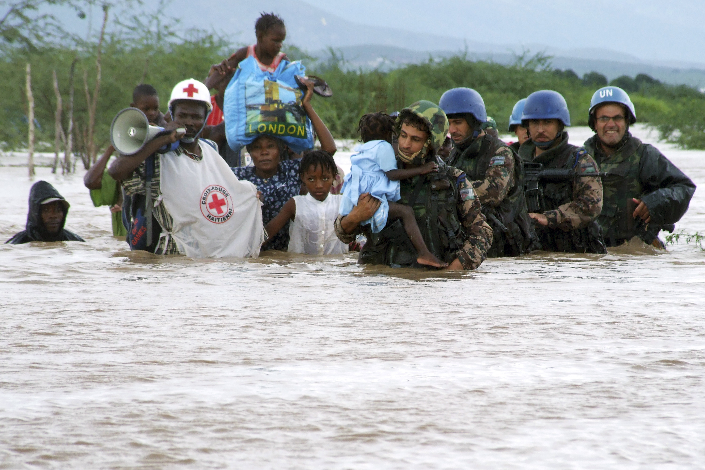 MINUSTAH Military Personnel Assists Hurricane Victims