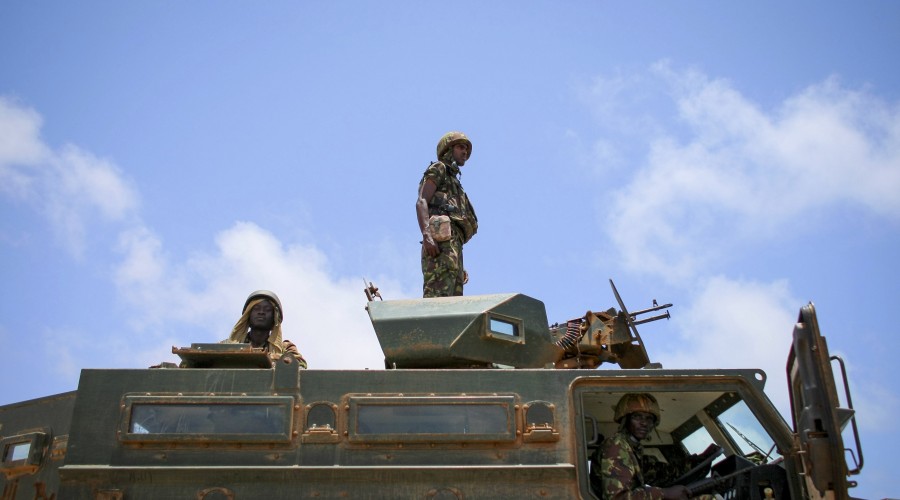 Kenyan soldiers from the African Union Mission in Somalia (AMISOM) on an armoured personnel carrier in Kismayo