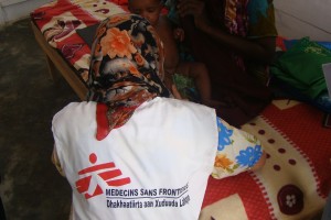 MSF staff working in a refinery camp to respond to the needs of IDPs located on the outskirts of Mogadishu