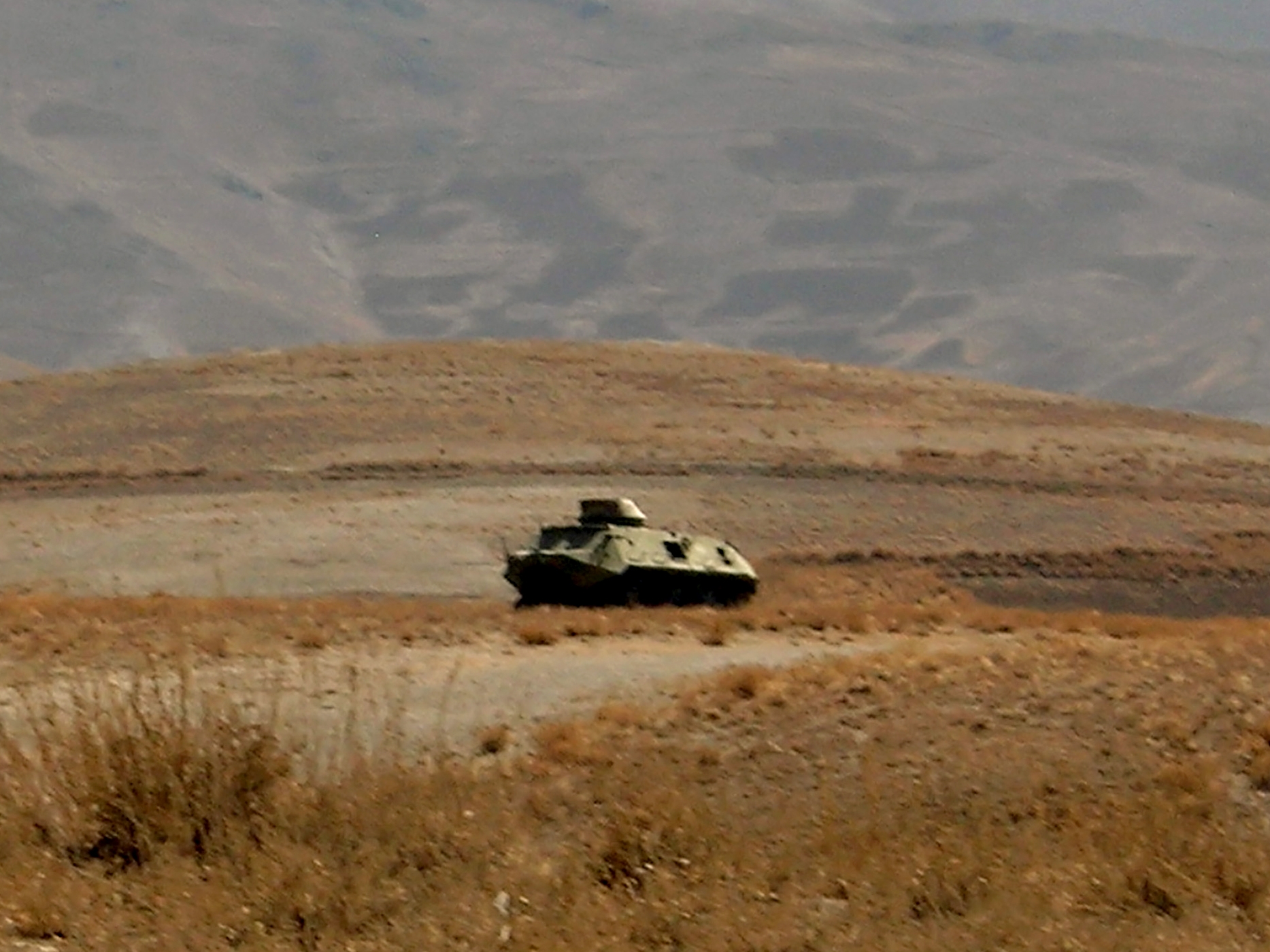 Taliban armoured personnel carrier passing through Wardak Province, Afghanistan