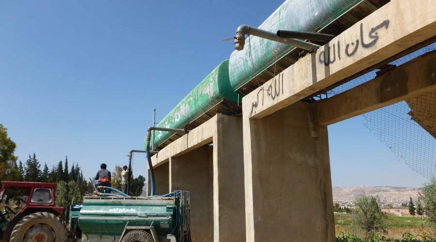 A water tanker being filled with water at a private well in Ayn Al Basha, Balqa Directorate, Jordan