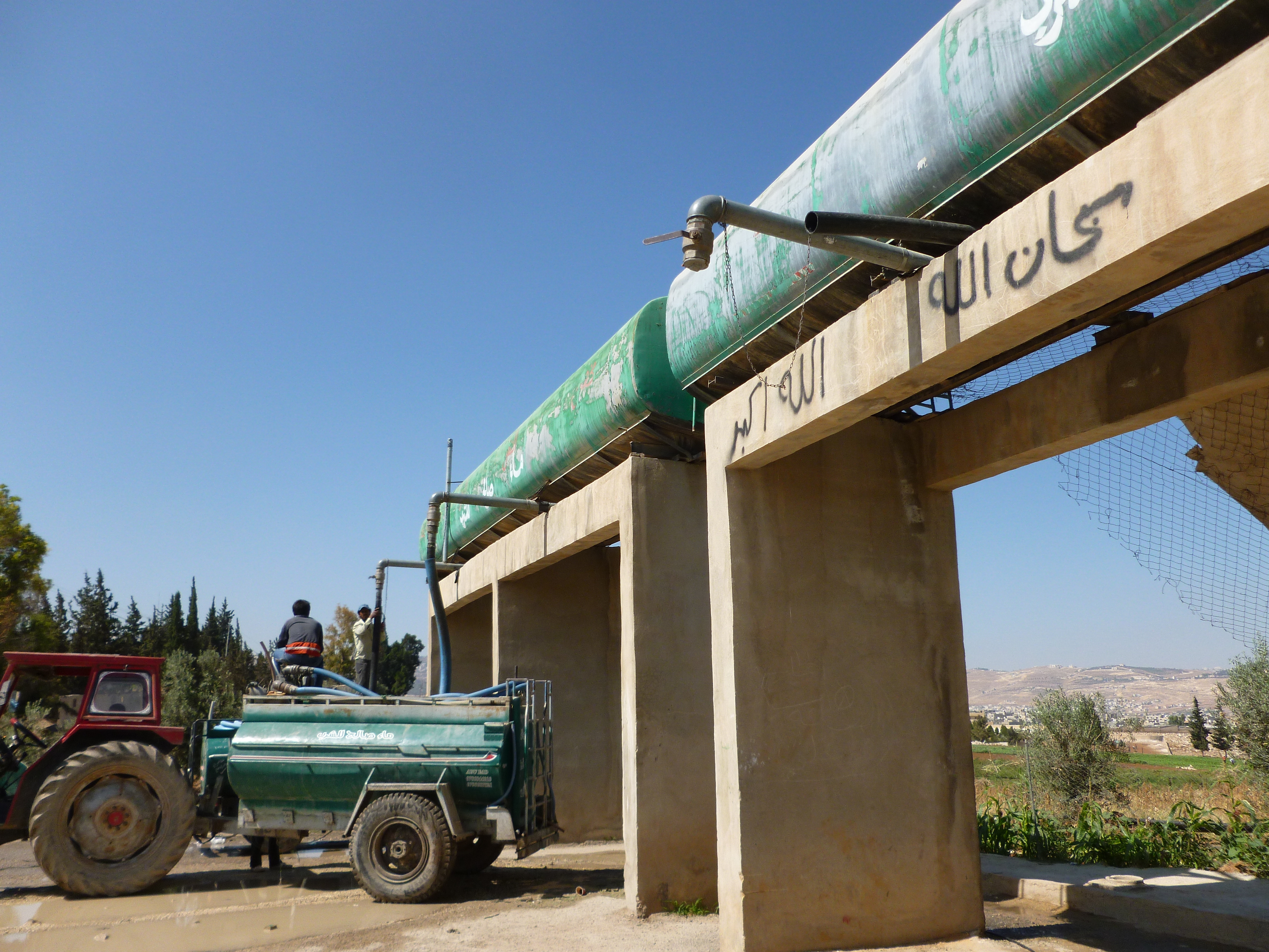 A water tanker being filled with water at a private well in Ayn Al Basha, Balqa Directorate, Jordan