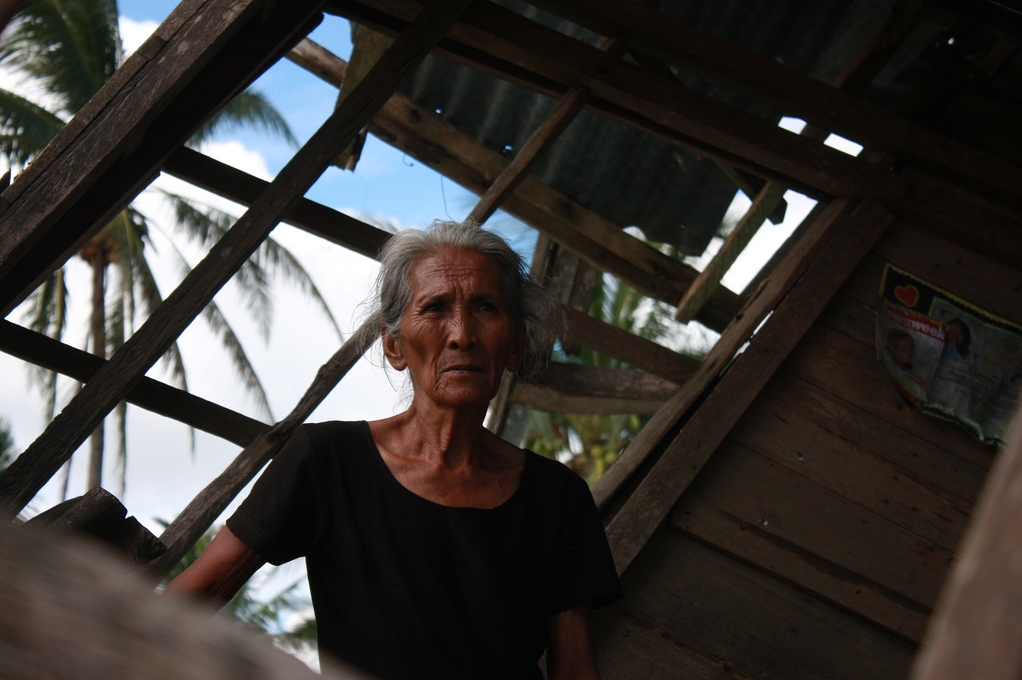 An elderly widow in her house after Typhoon Haiyan/Yolanda
