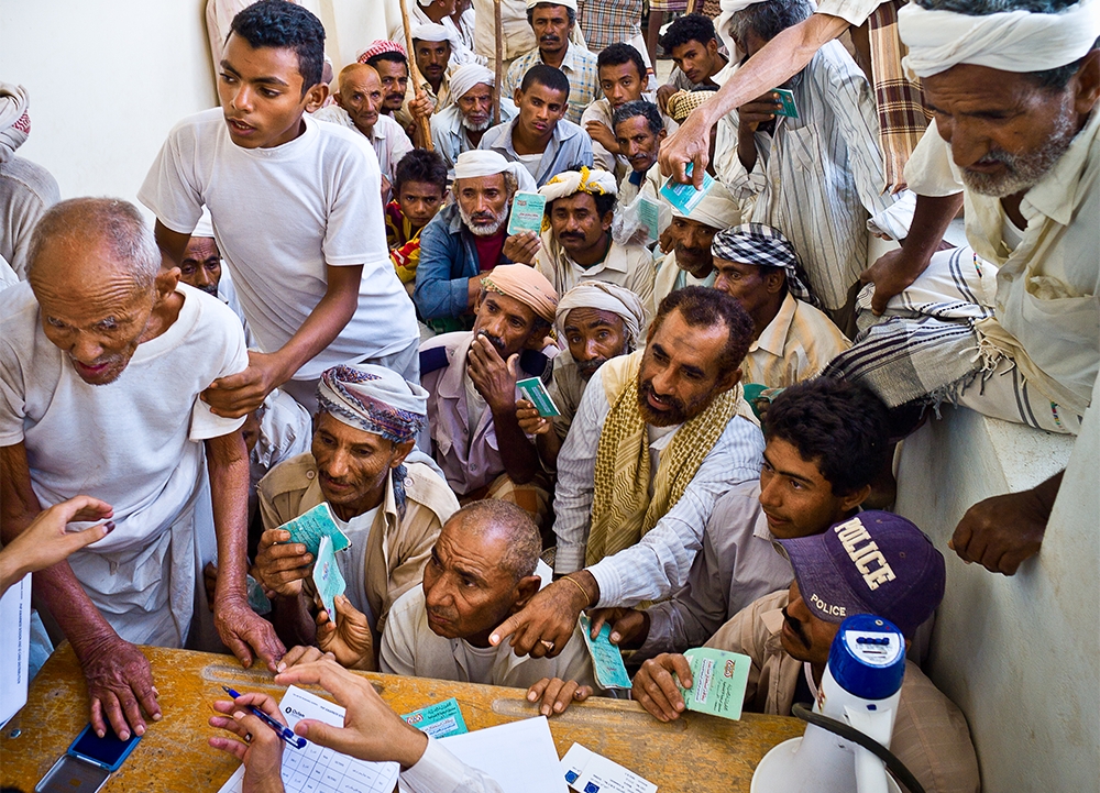 Distribution of identity cards by Oxfam staff in Al Hodeidah governorate, Yemen