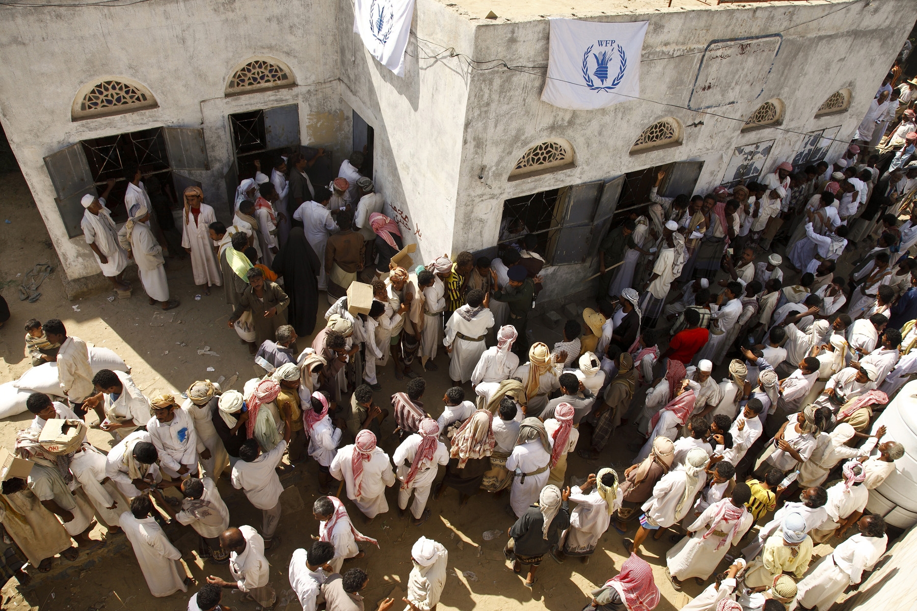 A WFP food distribution point for displaced families in north-west Yemen