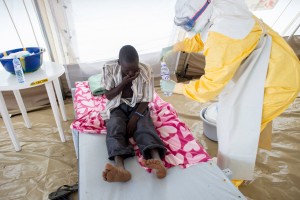 Nurse receives suspected Ebola patient in MSF Ebola Treatment Centre in Sierra Leone