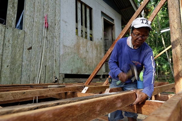 People in the Philippines rebuild their communities after the Tropical Storm Washi