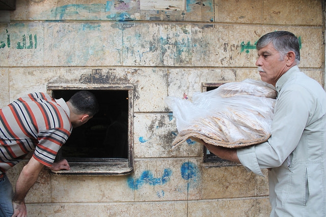 Bread distribution in Syria