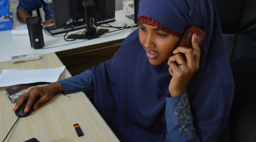 A phone operator for a food security monitoring project in Gaikayo, Somalia