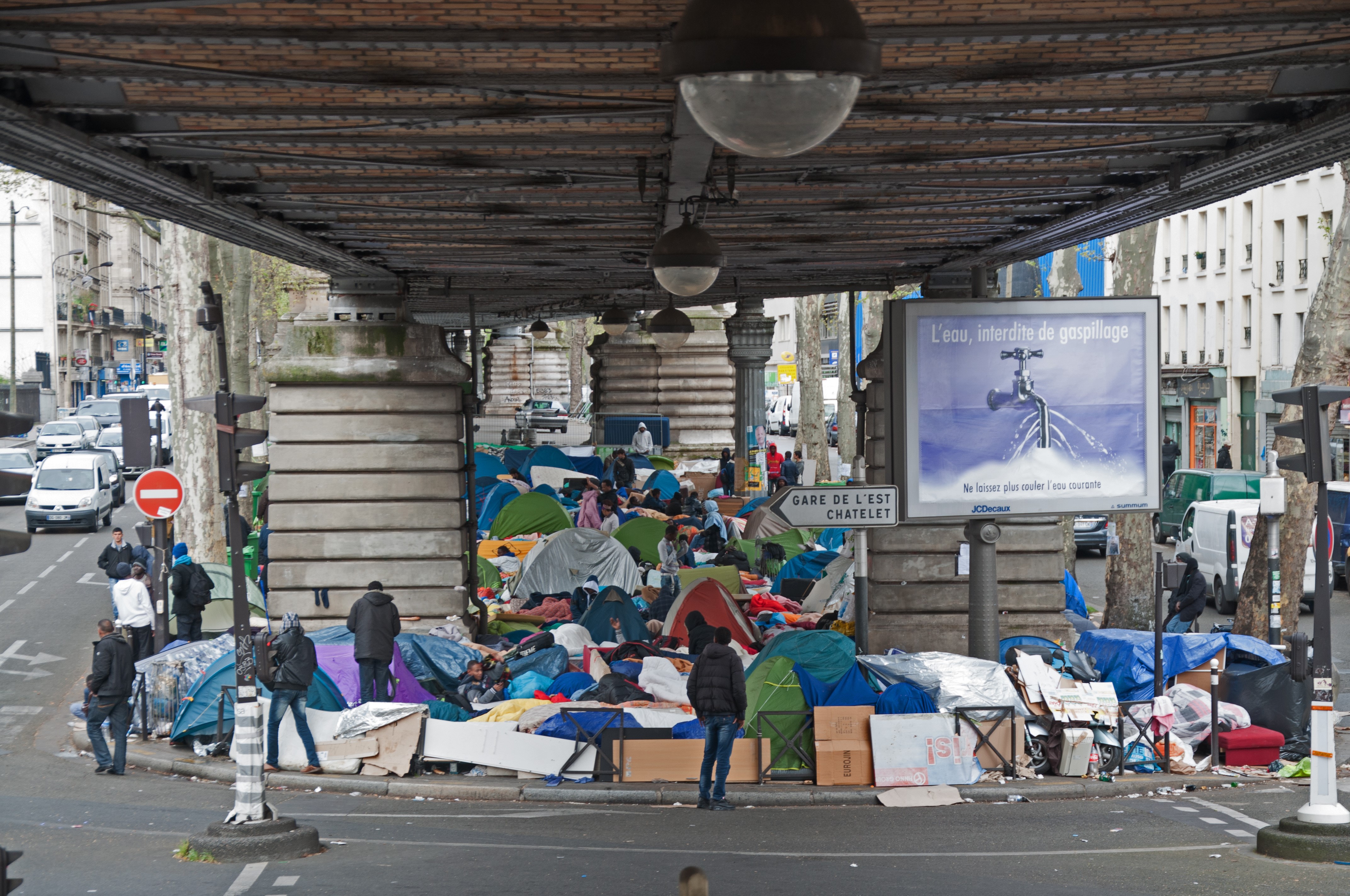 A refugee camp beside the Paris metro, France.