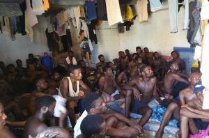 Refugees and migrants in a detention centre in Libya.