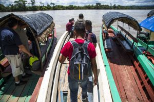 Hoping to reach the United States to claim asylum, a group of young Honduran refugees and migrants board a boat on the banks of the Usumacinta river in the town of La Técnica, Guatemala.
