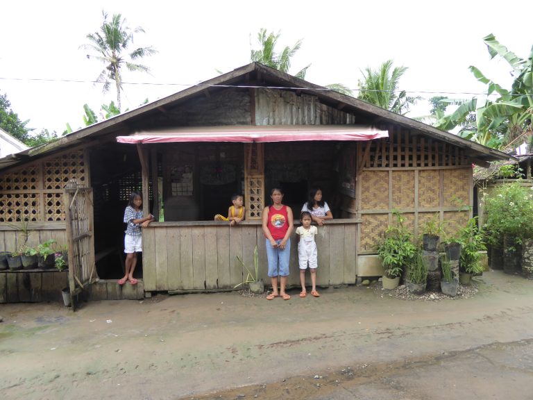 A mother of 12 and her carpenter husband rebuilt their house after Typhoon Yolanda with support from CARE Philippines and a local implementing partner.