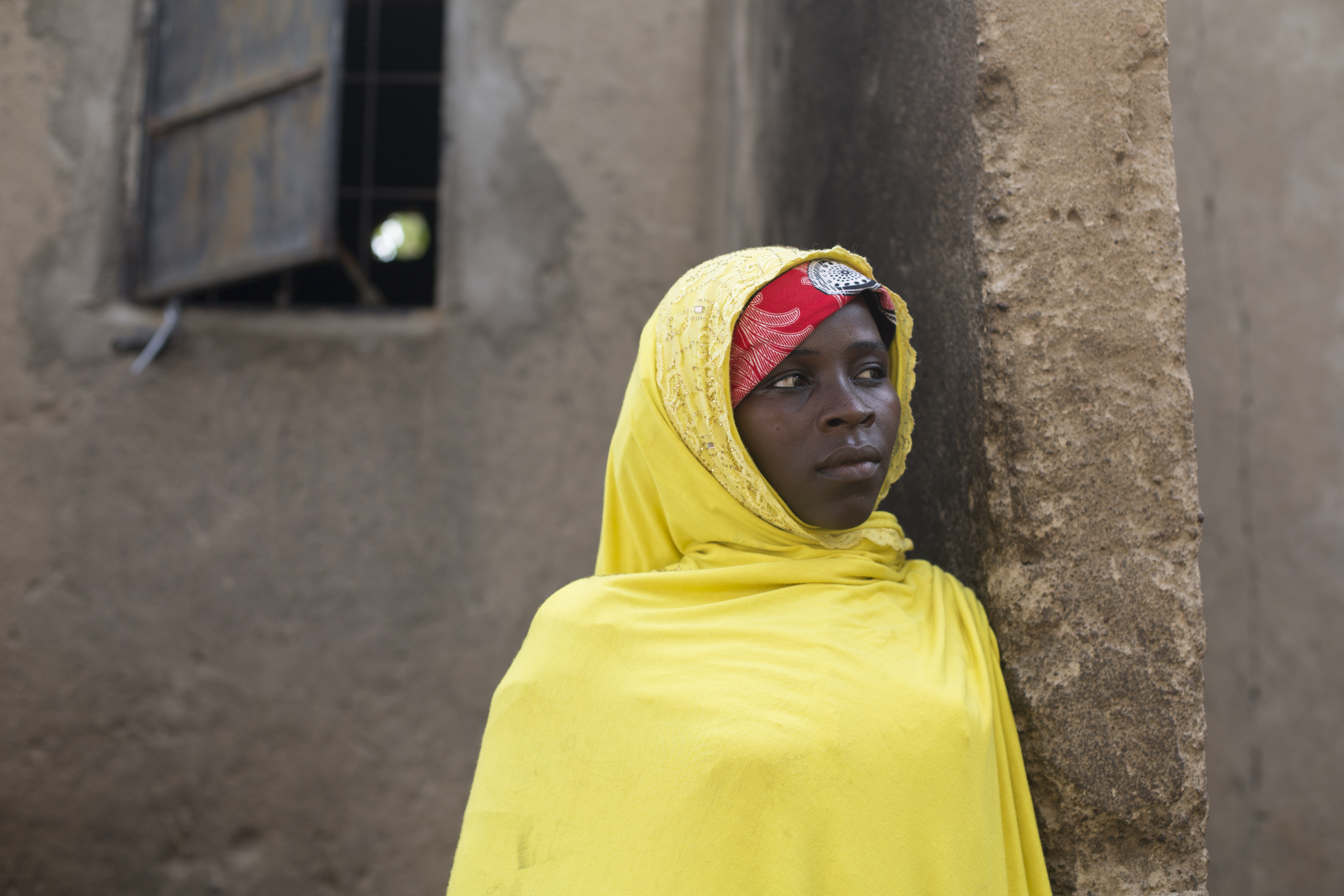 Zainab Tijani, 20, a Nigerian refugee recently returned from Cameroon in the home she shares with her family in the town of Banki, Nigeria, 2017. Photo: UNHCR