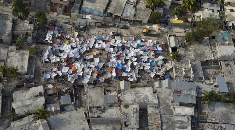 Haitians set up impromptu tent cities through the capital after an earthquake rocked Port-au-Prince, 2010.