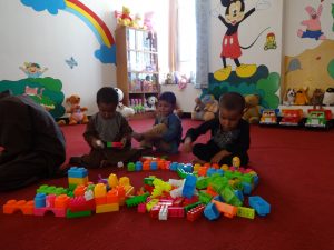 Children playing at a child-friendly space at a DRC urban centre in Herat.