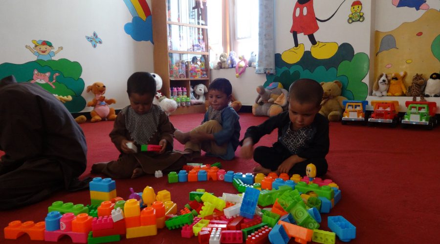Children playing at a child-friendly space at a DRC urban centre in Herat.