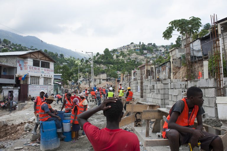 Women participating in rebuilding their neighbourhood in Port-au-Prince
