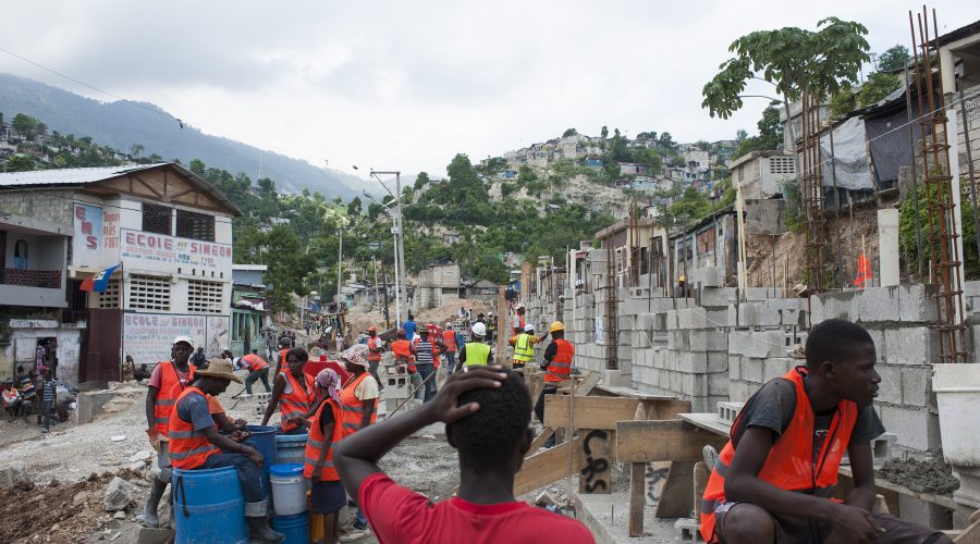 Women participating in rebuilding their neighbourhood in Port-au-Prince