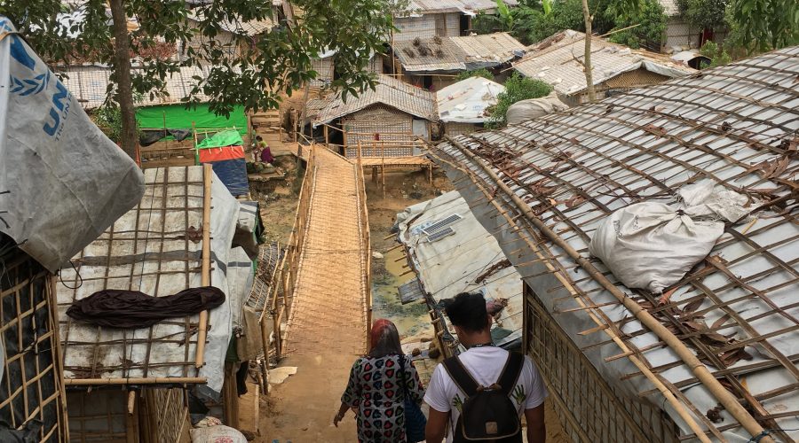 Research partners for the ‘Dignity in displacement’ project walk through the camp of Gundum in May 2018.