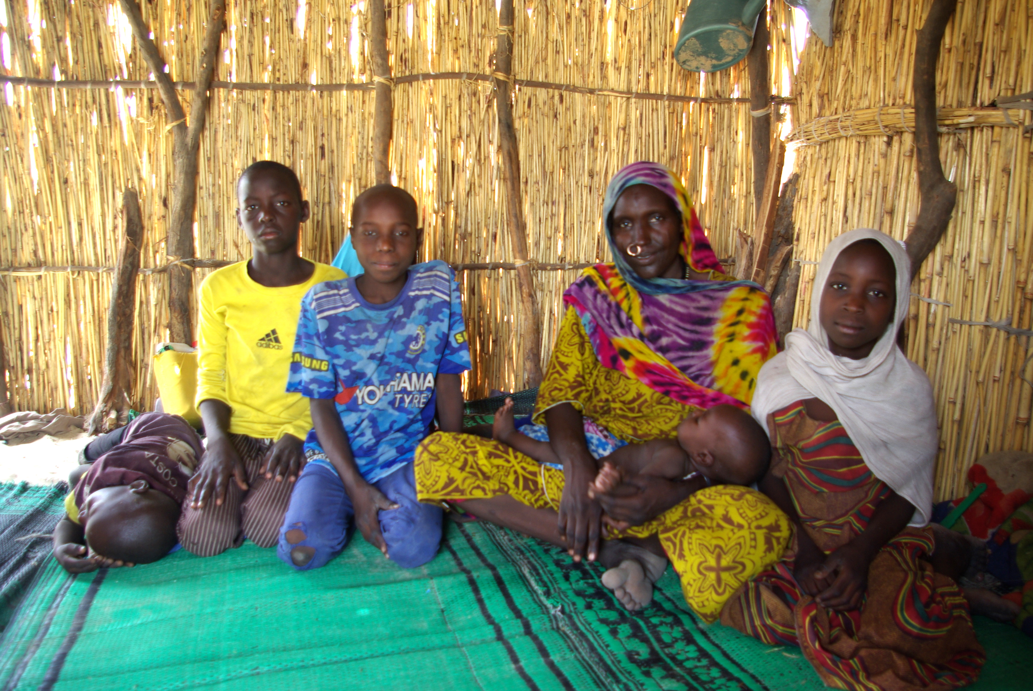 A mother and her children in an IDP camp in the Lac region of Chad.