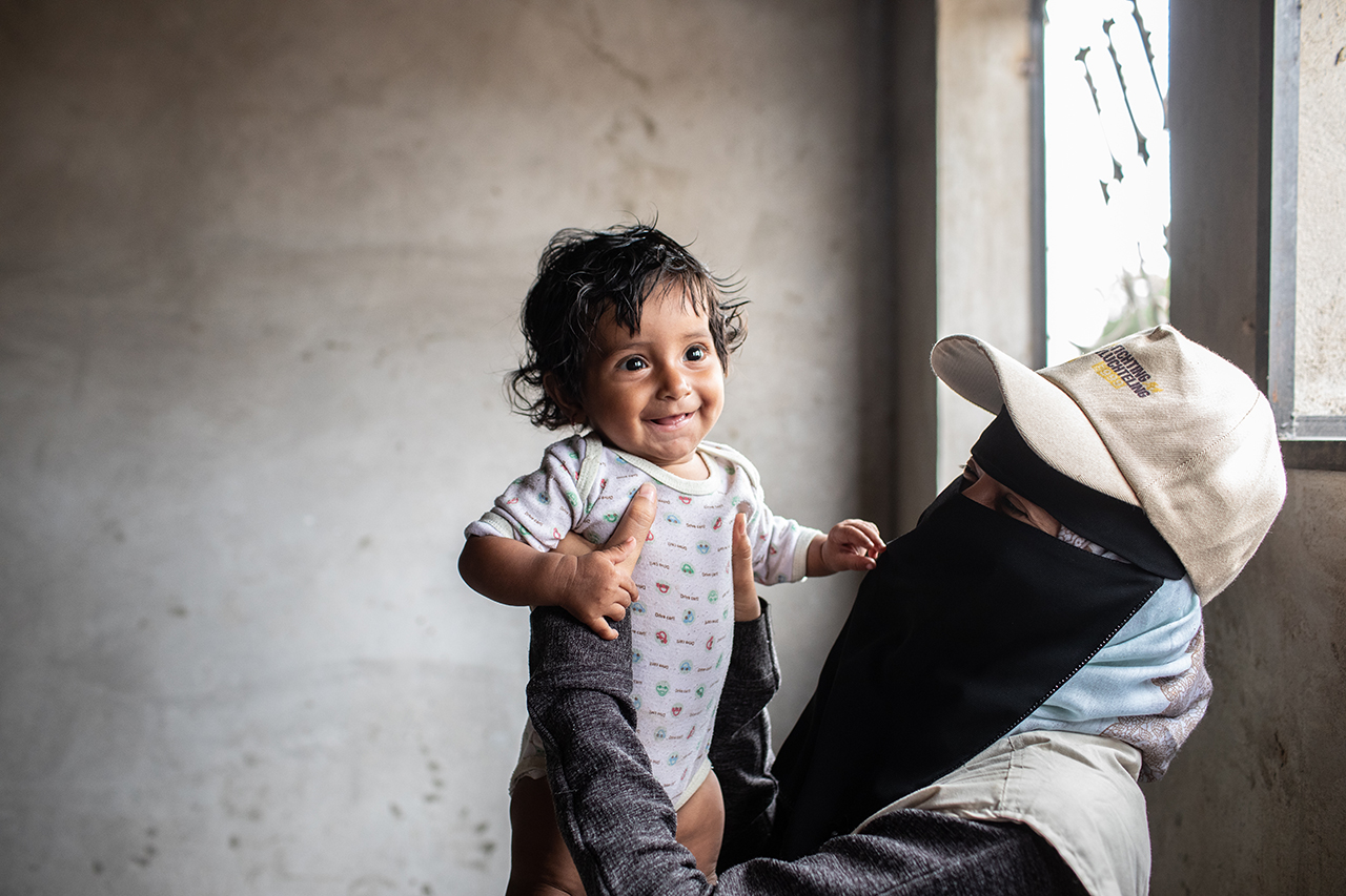 Adeeyah and her daughter at a mobile clinic in the suburb of Enma in Aden, Yemen