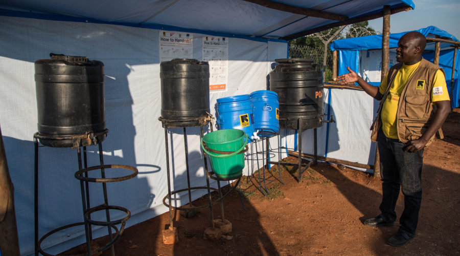 International Rescue Committee (IRC) Health Manager Stanley Anyigu shows the IRC-run triage unit at the reception center at Kyaka II Refugee Settlement in Kyegegwa District in western Uganda.