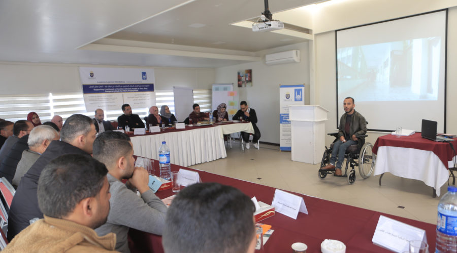 A workshop carried out by a person with physical disability to Islamic Relief Gaza staff addressing lessons learnt about disability inclusion