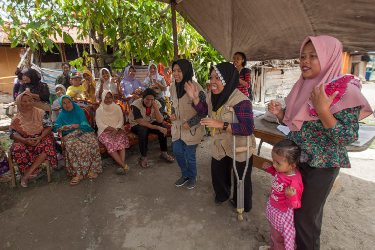 Members of Organisation of Persons with Disabilities-OPDs (wearing khaki vest) delivering hygiene promotion session for community members of Mantikole Village in Sigi, Central Sulawesi. Local OPDs are ASB Indonesia and the Philippines main partners in delivering inclusive humanitarian assistance particularly in WASH services, including for the tsunami and earthquake affected community in Central Sulawesi, Indonesia.