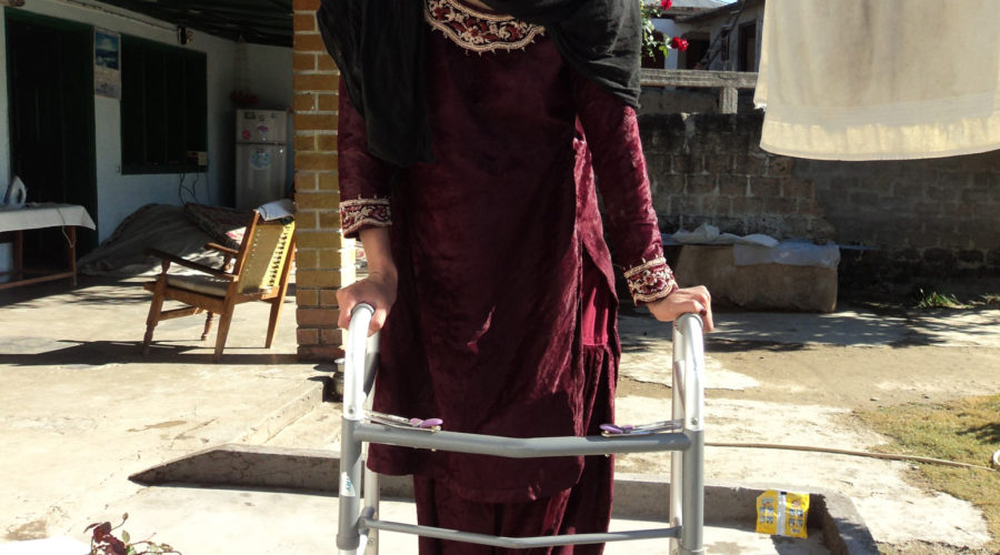 Mansehra District, Pakistan: a student enjoys improved access to education after assistive devices and accessibility ramps are provided at her school HRDS/Afzal