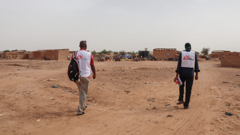MSF teams supervise the refueling of water polytanks in Kongoussi, Burkina Faso