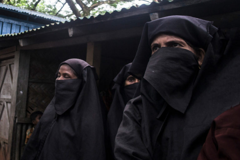 Rohingya women waiting outside of an NGO office in Kutupalong Refugee Camp